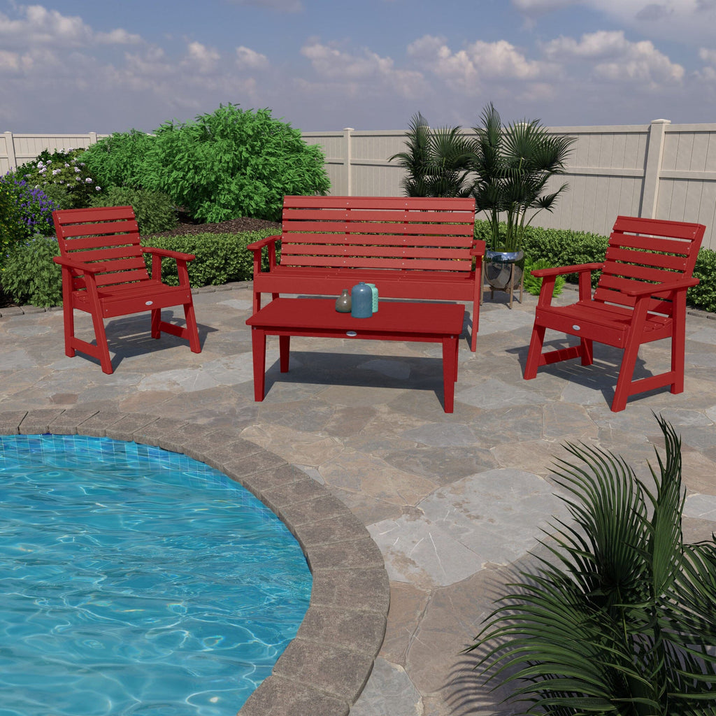 Red 5ft Riverside bench, 2 chairs, and table by a pool