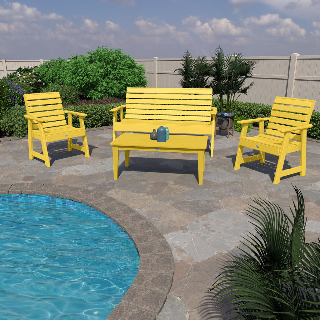 Yellow 5ft Riverside bench, 2 chairs, and table by a pool