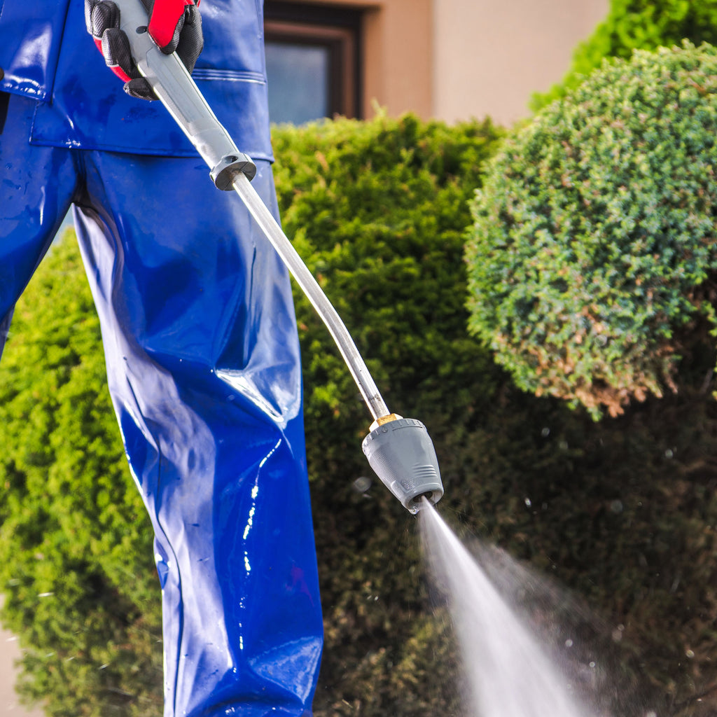 Power washing with blue outfit