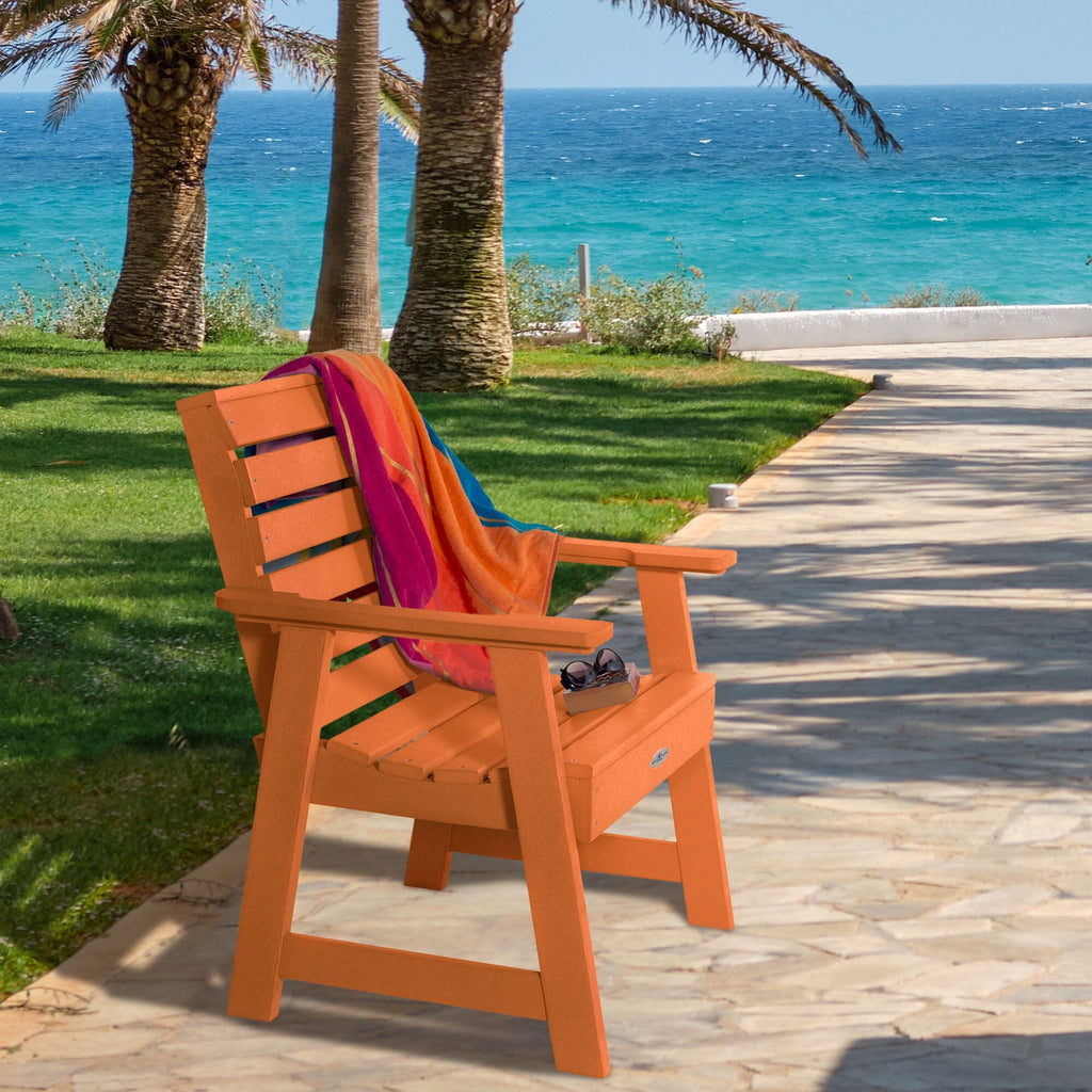 Orange Riverside Garden chair with towel and sunglasses 