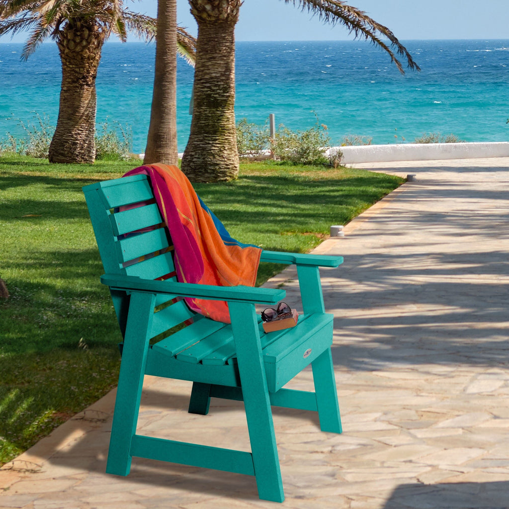 Blue Riverside garden chair with towel and sunglasses