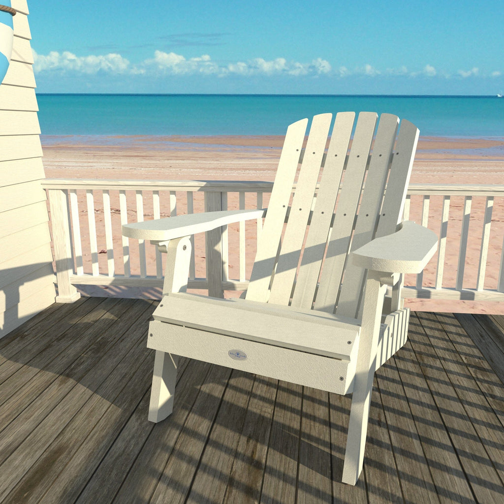 White Cape folding Adirondack chair on a deck overlooking the beach