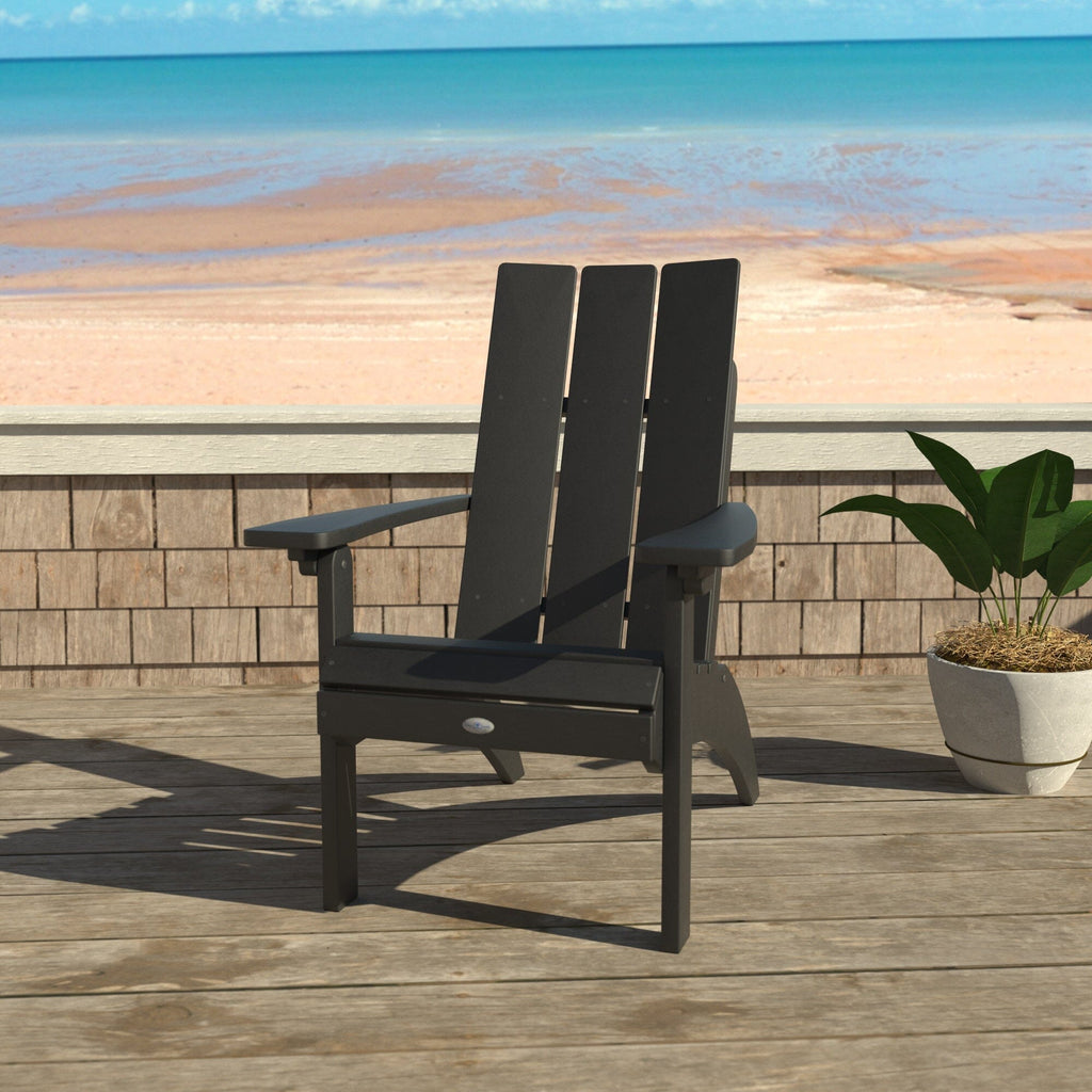 Black Corolla Comfort Height Adirondack Chair with beach background