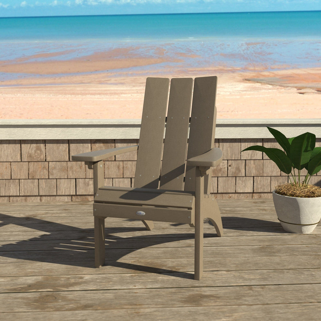 Tan Corolla Comfort Height Adirondack Chair with beach background