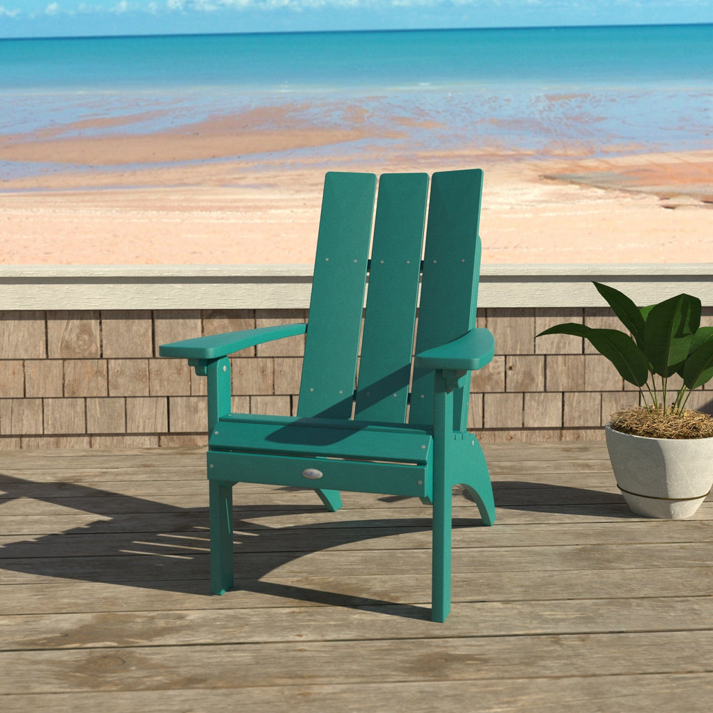 Blue Corolla Comfort Height Adirondack chair with beach background