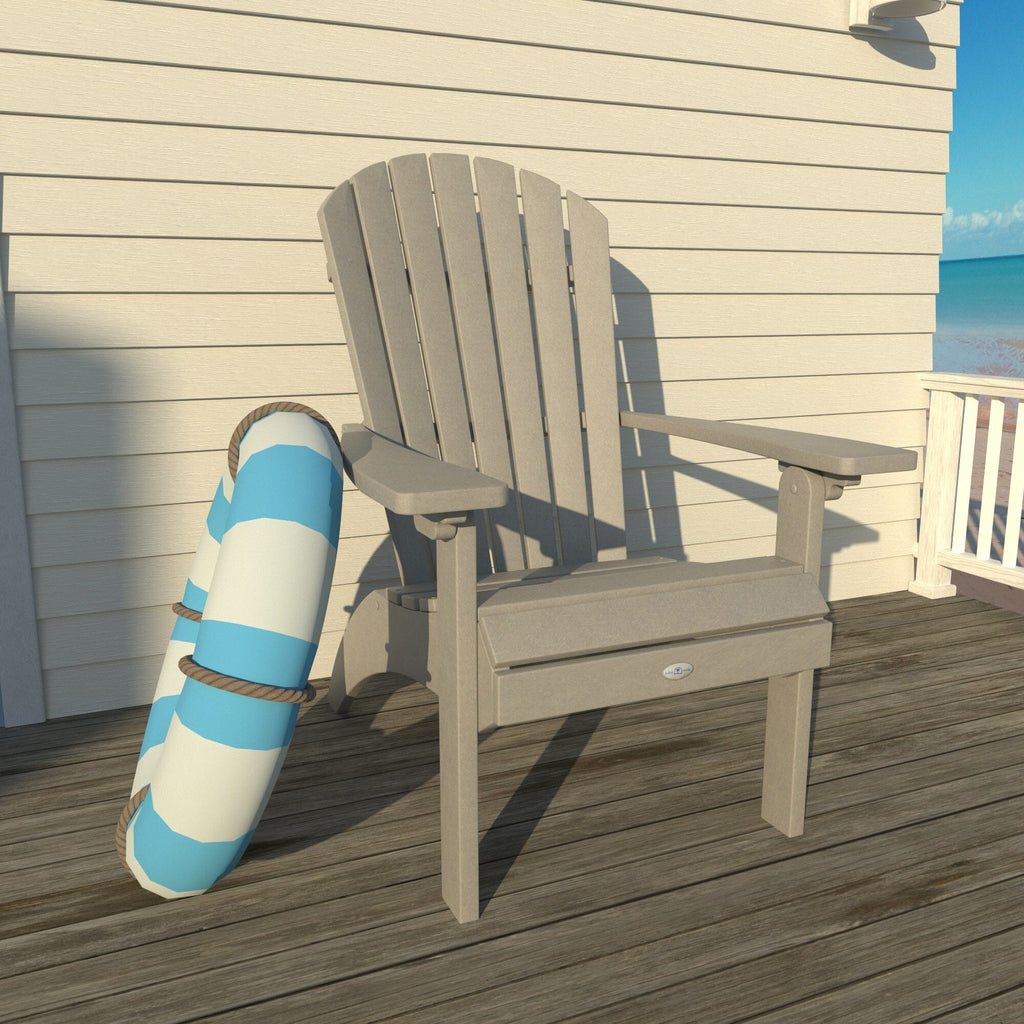 Gray Waterfall comfort height Adirondack chair on a deck with a life ring