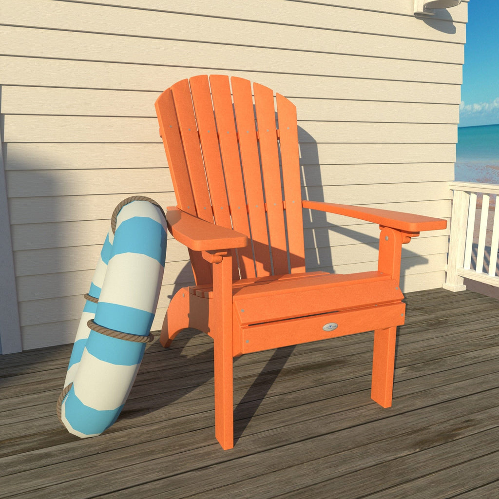 Orange Waterfall comfort height Adirondack chair on a deck with a life ring