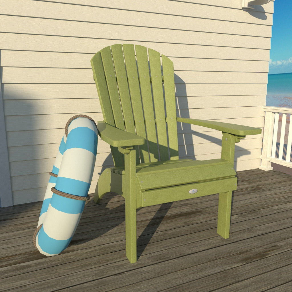 Green Waterfall comfort height Adirondack chair on a deck with a life ring