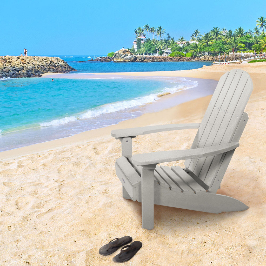 Gray Cape Classic Adirondack Chair on a beach 