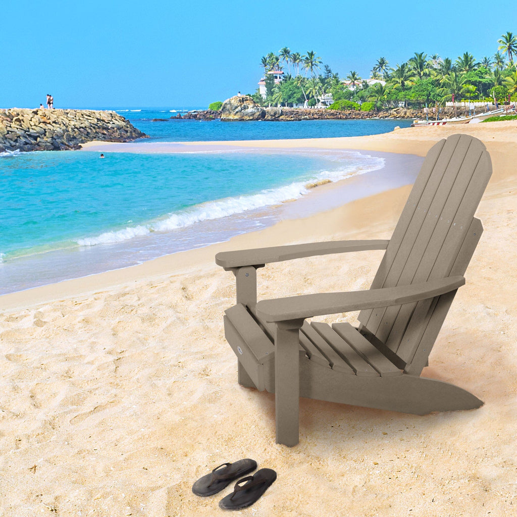 Tan Cape Classic Adirondack Chair on a beach 