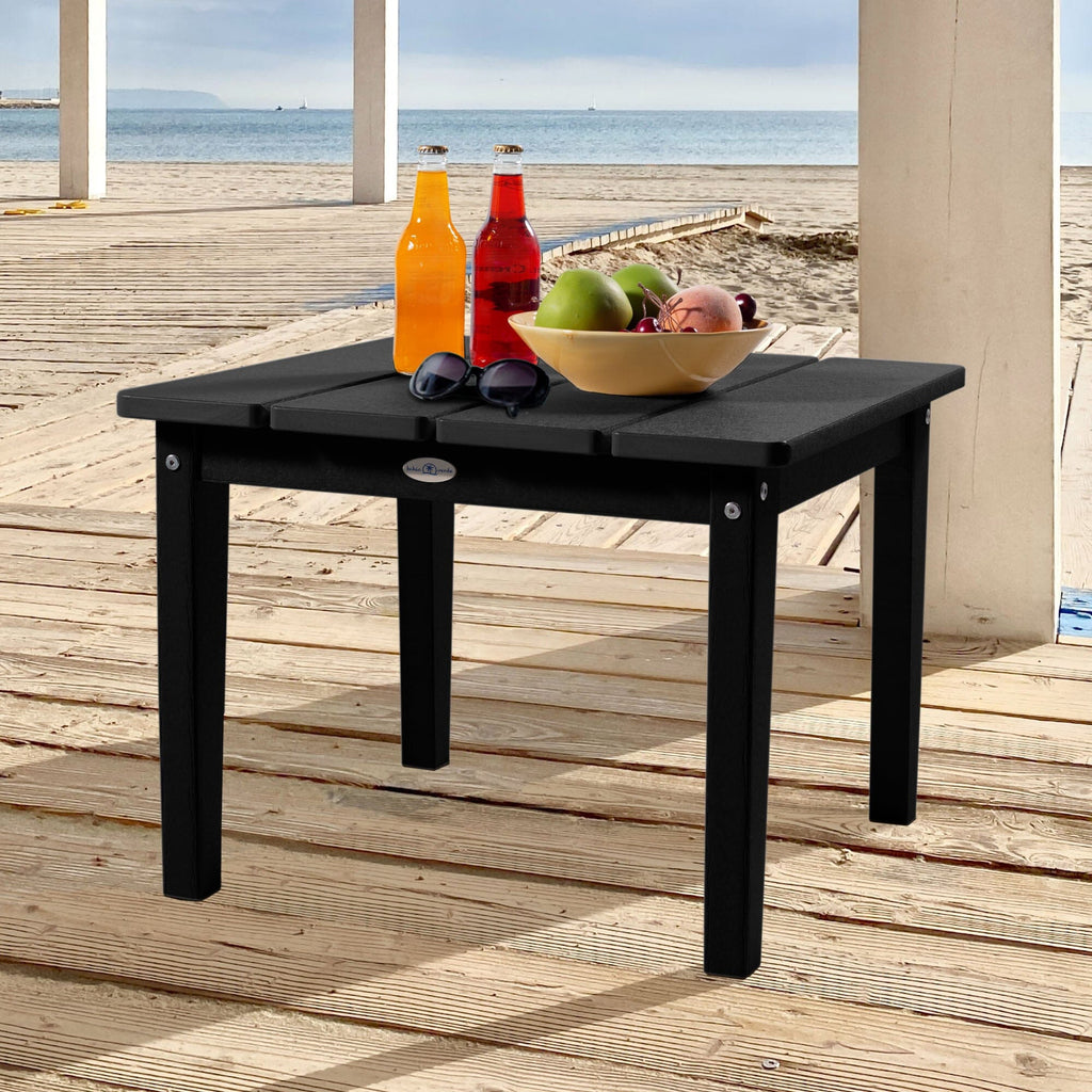 Large black Adirondack side table with drinks, fruit, and sunglasses