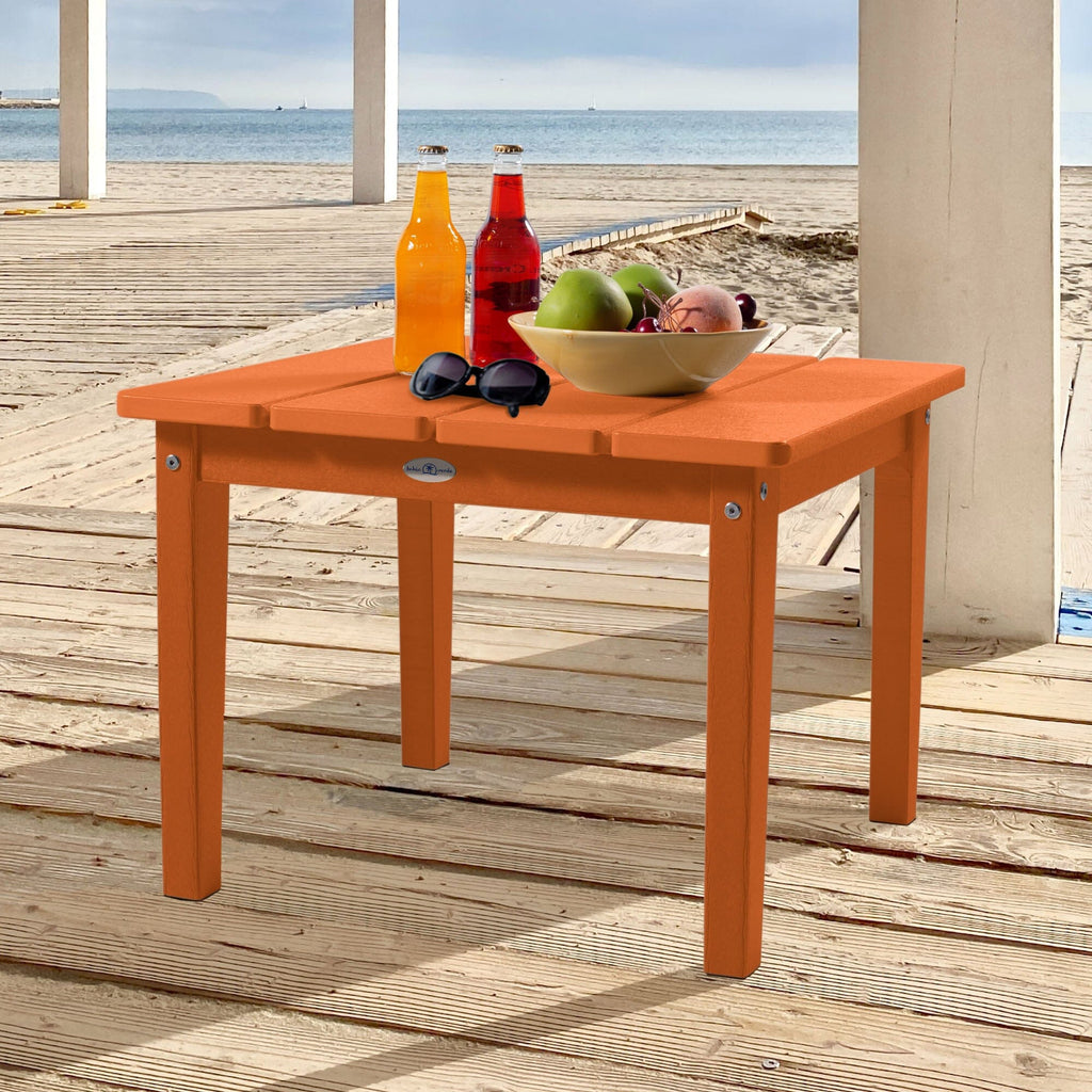Large orange Adirondack side table with drinks, fruit, and sunglasses