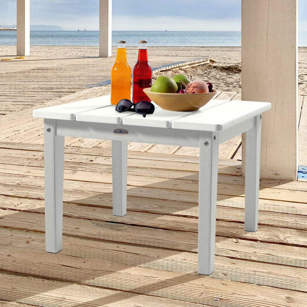 Large white Adirondack side table with drinks, fruit, and sunglasses