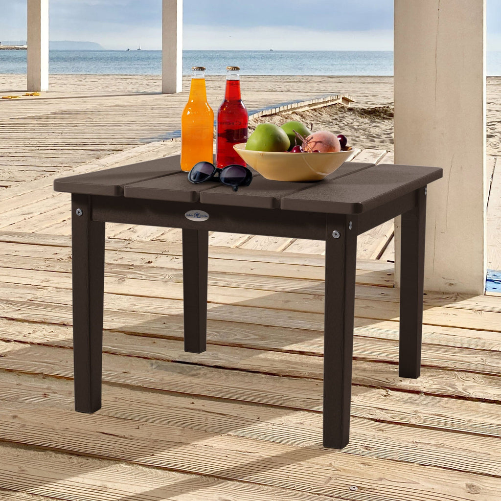 Large brown Adirondack side table with drinks, fruit, and sunglasses