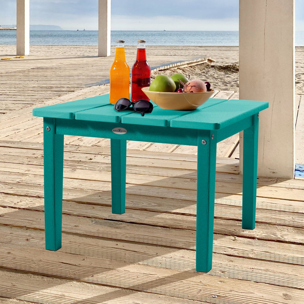 Large blue Adirondack side table with drinks, fruit, and sunglasses